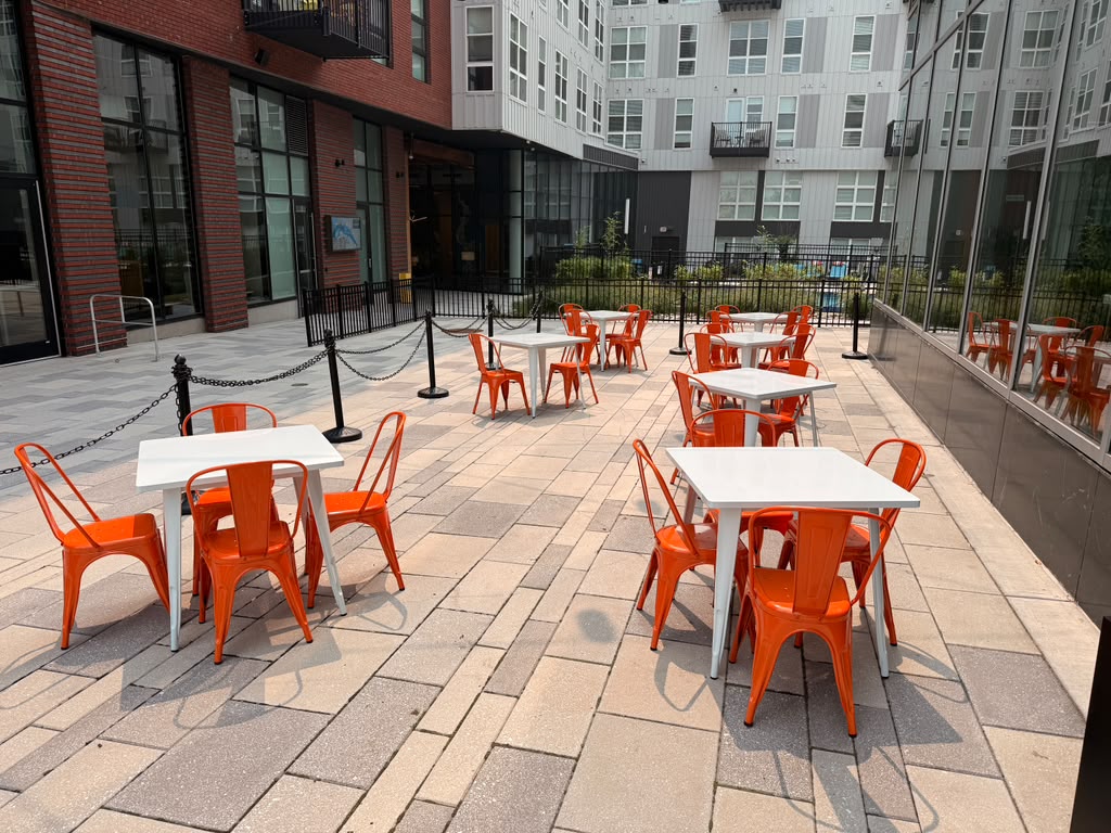 Otto Richmond's outdoor patio with café tables and chairs